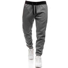 Men's Fleece Casual Sports Pants | Elastic Drawstring Waistband | Tapered Leg Design | Soft Breathable Fleece Fabric | Ribbed Ankle Cuffs | Modern Athletic Style | Versatile Everyday Wear | Comfortable Fit